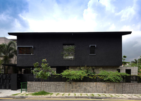 Formwerkz Architects house extension features cantilevered concrete box