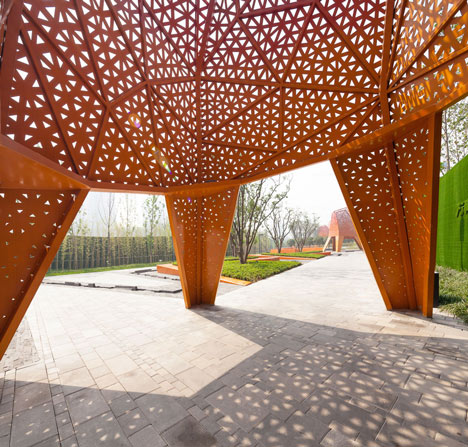 Four-legged perforated metal pavilions rise above Fengming Mountain Park
