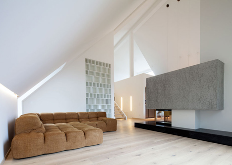 House B.A.B.E. by Destilat features windows dotted across shingle-clad facade