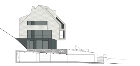 South west facade of House B.A.B.E. by Destilat features windows dotted across shingle-clad facade