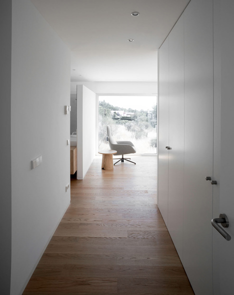 Casa H by Bojaus Arquitectura features a facade covered in holes