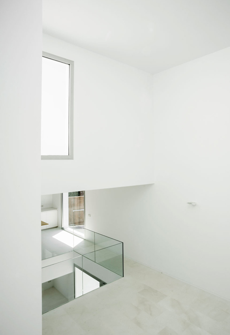 Casa H by Bojaus Arquitectura features a facade covered in holes