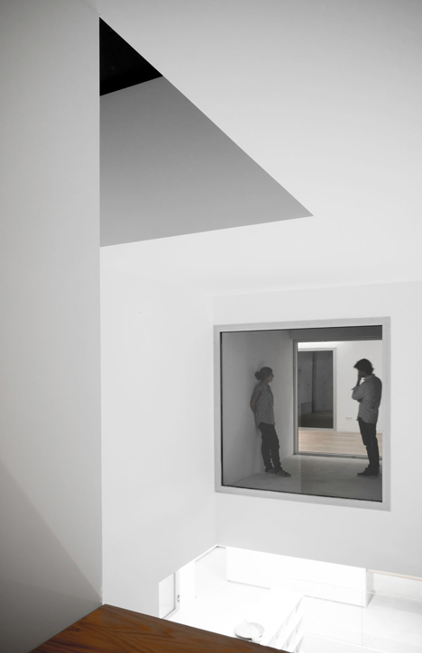 Casa H by Bojaus Arquitectura features a facade covered in holes