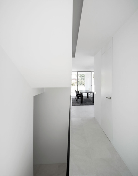 Casa H by Bojaus Arquitectura features a facade covered in holes