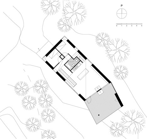 Timber-clad House M-M by Tuomas Siitonen wraps around a sheltered garden
