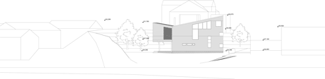 Timber-clad House M-M by Tuomas Siitonen wraps around a sheltered garden