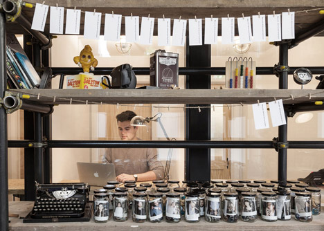 Industrial-style offices by DH Liberty mix reclaimed objects with minimal aesthetic