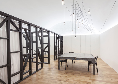 Industrial-style offices by DH Liberty mix reclaimed objects with minimal aesthetic