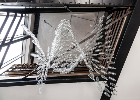 Industrial-style offices by DH Liberty mix reclaimed objects with minimal aesthetic