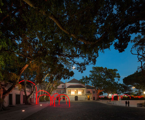 Luminous red arches by LIKEarchitects installed at Portuguese palace