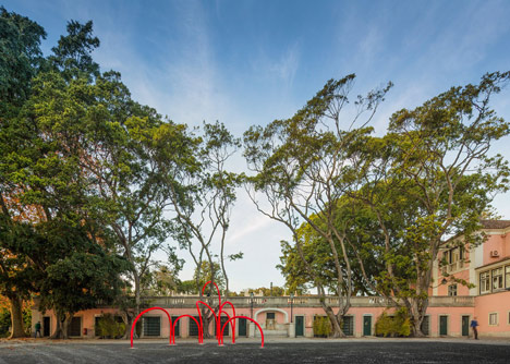Luminous red arches by LIKEarchitects installed at Portuguese palace
