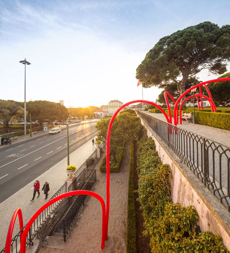 Luminous red arches by LIKEarchitects installed at Portuguese palace