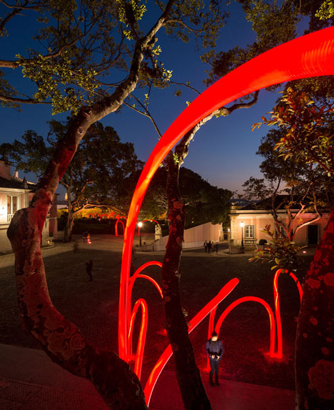 Luminous red arches by LIKEarchitects installed at Portuguese palace