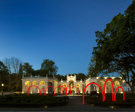 Luminous red arches by LIKEarchitects installed at Portuguese palace