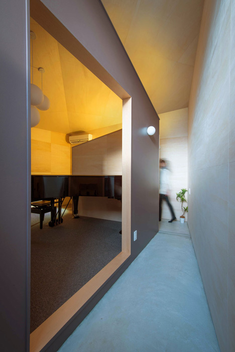 Piano House by NI&Co. Architects offers a secluded spot for making music