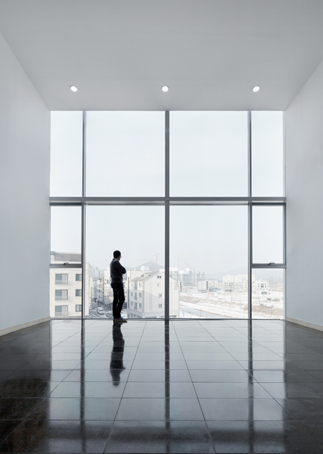 Nameless Architecture adds concrete church to growing Korean town