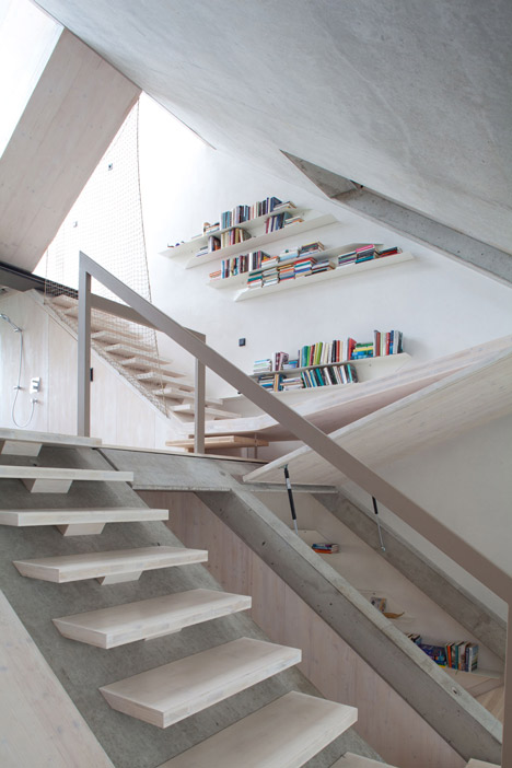 Townhouse B14 by XTH-berlin has slanted walls and doors