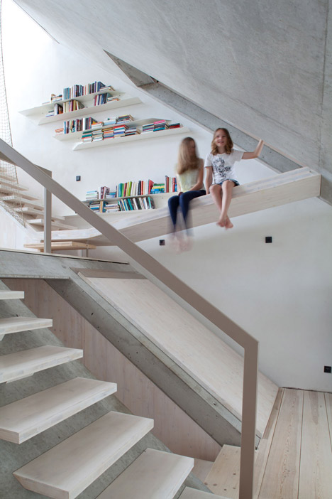 Townhouse B14 by XTH-berlin has slanted walls and doors