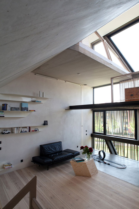 Townhouse B14 by XTH-berlin has slanted walls and doors