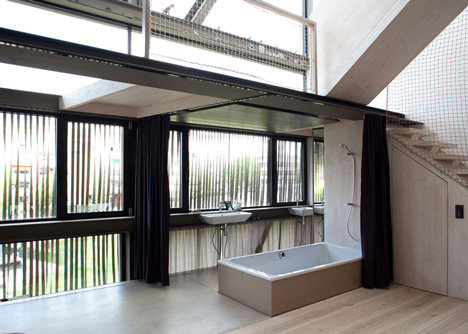 Townhouse B14 by XTH-berlin has slanted walls and doors
