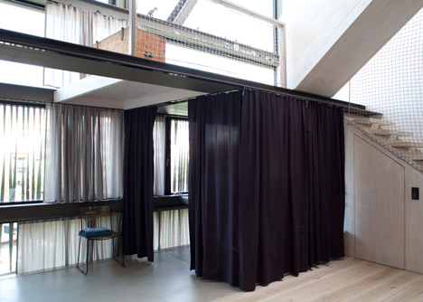 Townhouse B14 by XTH-berlin has slanted walls and doors