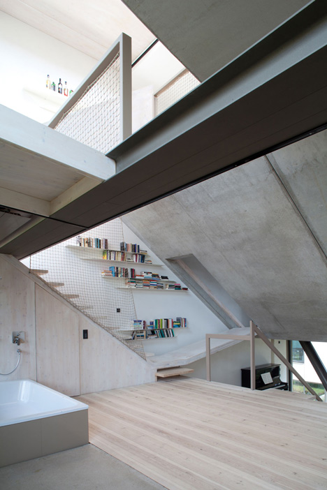 Townhouse B14 by XTH-berlin has slanted walls and doors
