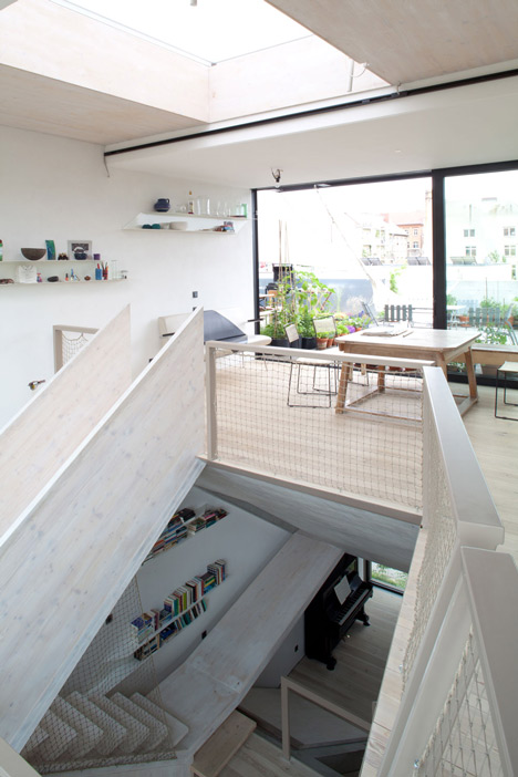 Townhouse B14 by XTH-berlin has slanted walls and doors
