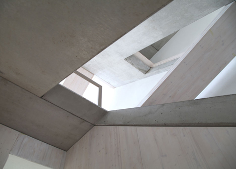 Townhouse B14 by XTH-berlin has slanted walls and doors