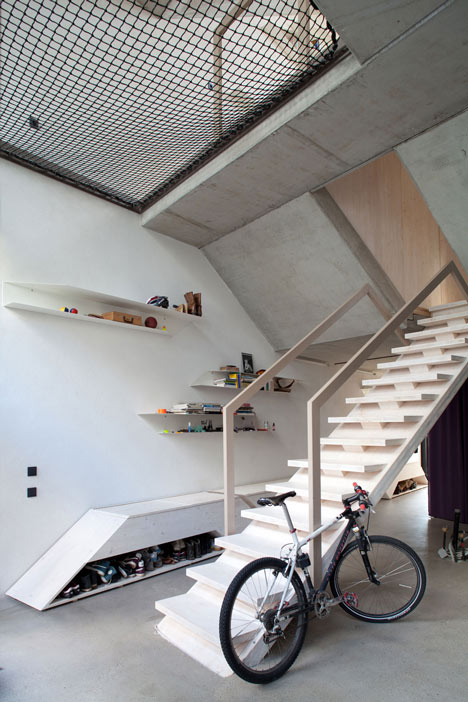 Townhouse B14 by XTH-berlin has slanted walls and doors
