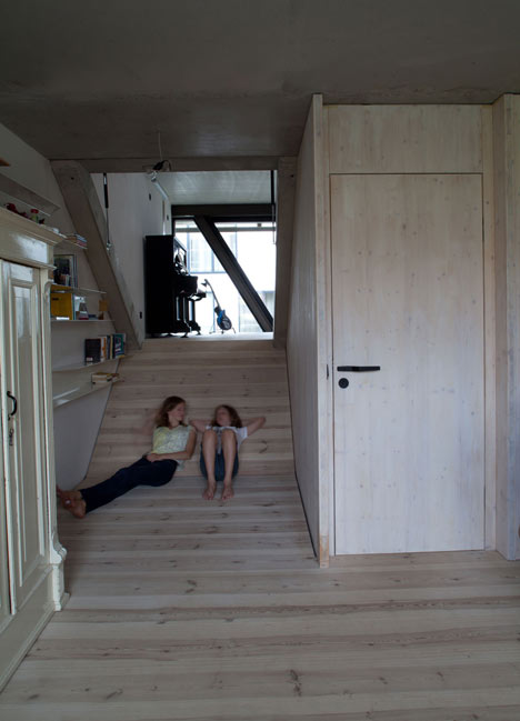 Townhouse B14 by XTH-berlin has slanted walls and doors