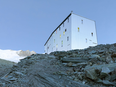 Steel-clad mountain hut by Savioz Fabrizzi Architectes wraps over an Alpine ridge