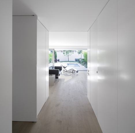 Parede 11 house by Humberto Conde has hinged protective panels