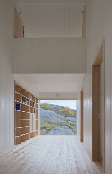 Vega Cottage by Kolman Boye Architects references weathered Norwegian boathouses