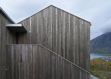 Vega Cottage by Kolman Boye Architects references weathered Norwegian boathouses