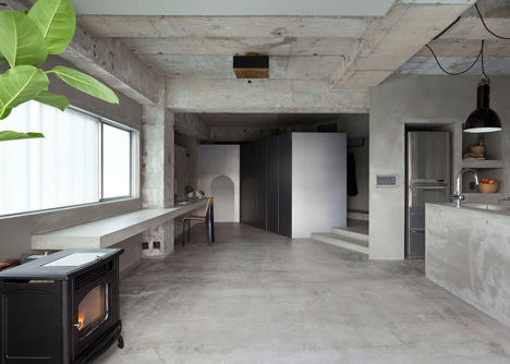 Bare concrete apartment by Airhouse Design Office presents its own fashion exhibitions