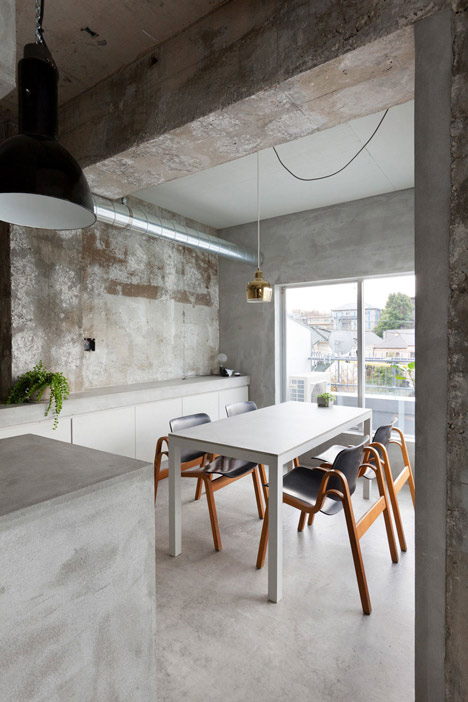 Bare concrete apartment by Airhouse Design Office presents its own fashion exhibitions