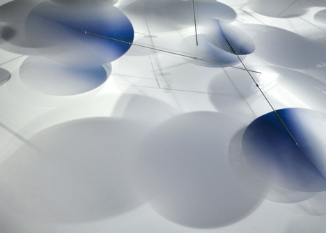 Moving plastic petals balanced in Interconnection installation by Nao Tamura