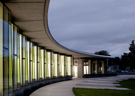 Water treatment facility by Skylab Architecture features a roof of grass-covered fins