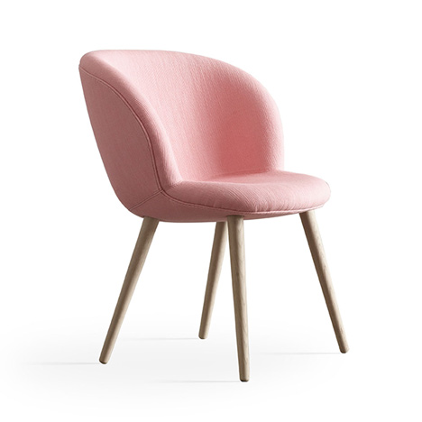 Busk and Hertzog adds wooden legs to Capri chairs for Halle