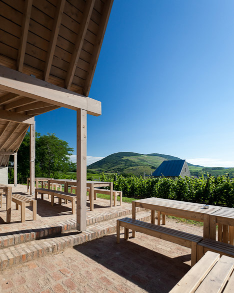 Earthy cabins hide amongst the vineyards<br /> at the Almagyar Wine Terrace in Hungary by by Péter Gereben and Balázs Marián