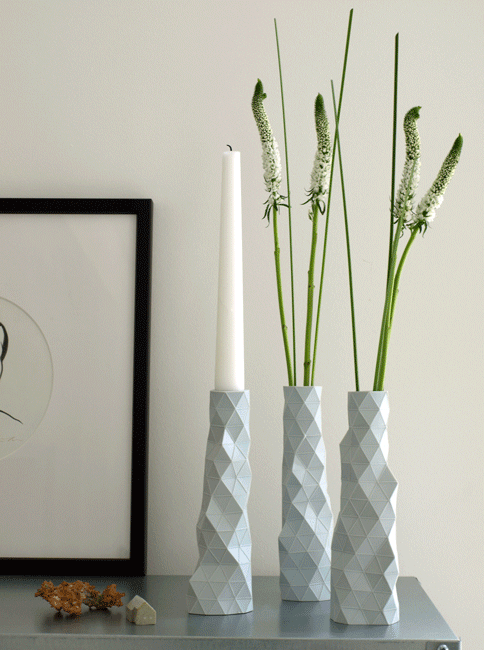 This image and main: Dual-function Faceture bud vase/candleholders are available in white, dark grey, mid grey, pink, mint, blue This image and main: Dual-function Faceture bud vase/candleholders are available in white, dark grey, mid grey, pink, mint, blue