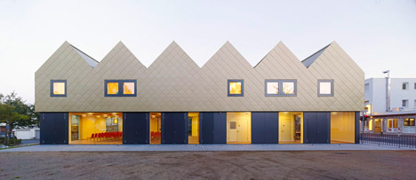 netzwerkarchitekten completes German community centre with metal-clad zigzagging roof