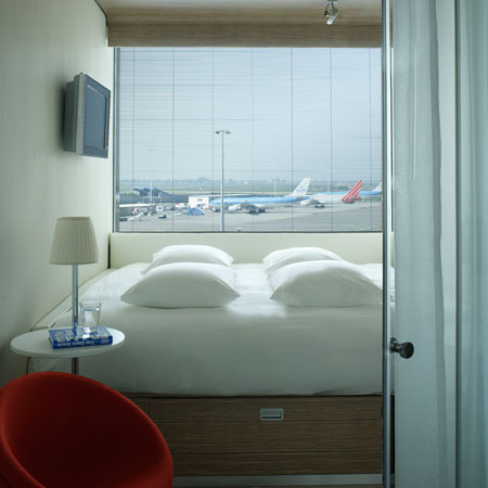 CitizenM is a hotel made of prefabricated room modules at Schiphol Airport, Amsterdam, designed by Dutch architectural firm Concrete.
