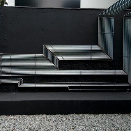 Pipe Light is an installation on an abandoned house in São Paulo, Brazil by French-Brazilian architects Triptyque