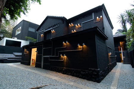 Pipe Light is an installation on an abandoned house in São Paulo, Brazil by French-Brazilian architects Triptyque