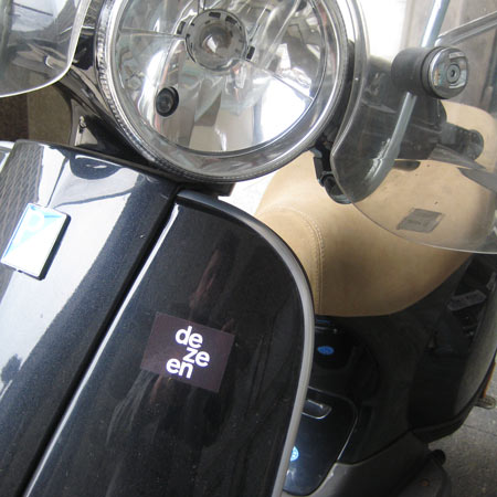 Dezeen stickers in Milan – this time in black