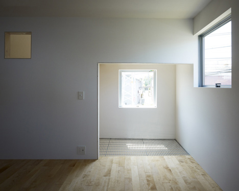 Small House with big Spiral Staircase by Hideshi Abe