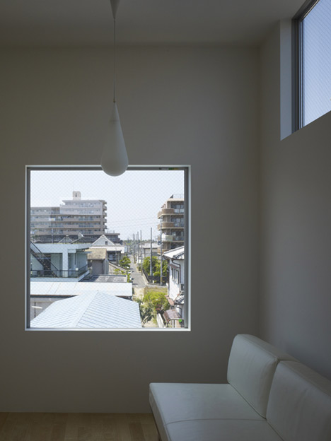 Small House with big Spiral Staircase by Hideshi Abe