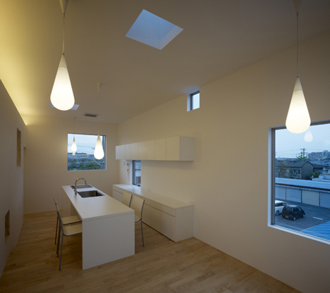 Small House with big Spiral Staircase by Hideshi Abe