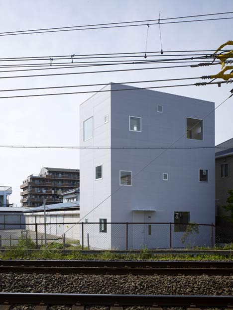 Small House with big Spiral Staircase by Hideshi Abe